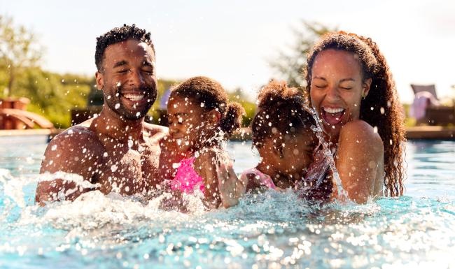 a family in a pool